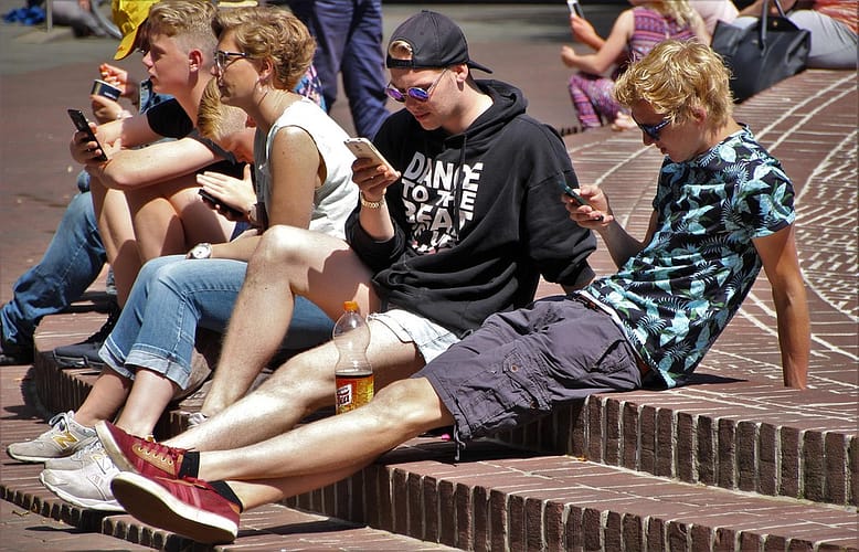 people on their phone
